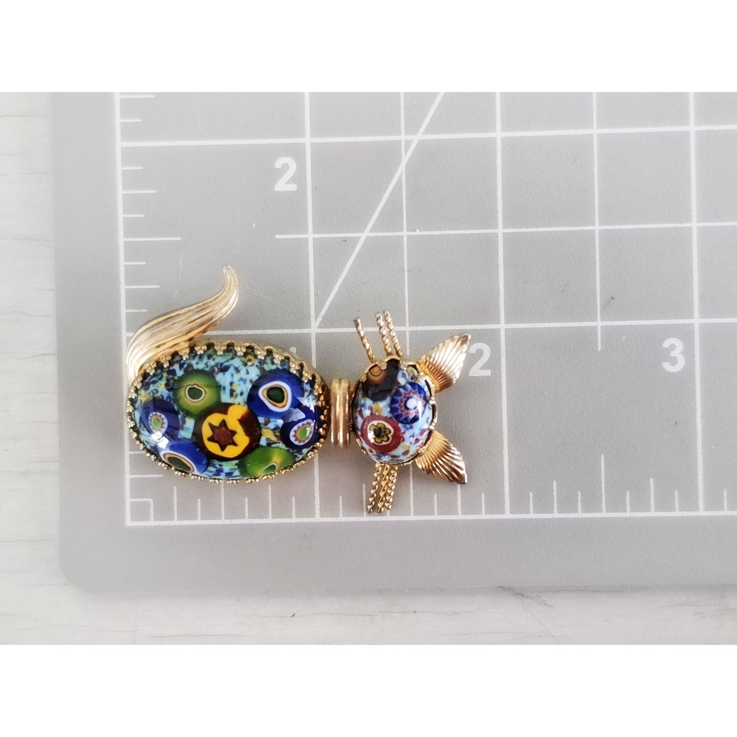 Vintage Millefiori Cat Brooch with Deep Blue Background