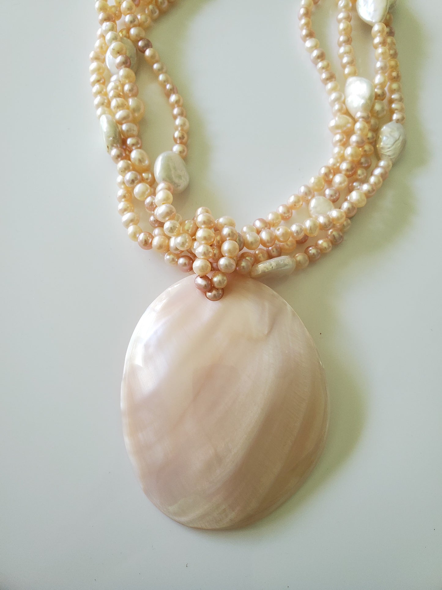 Multi-strand Pink and Cream Freshwater Pearls with Large MOP Pendant