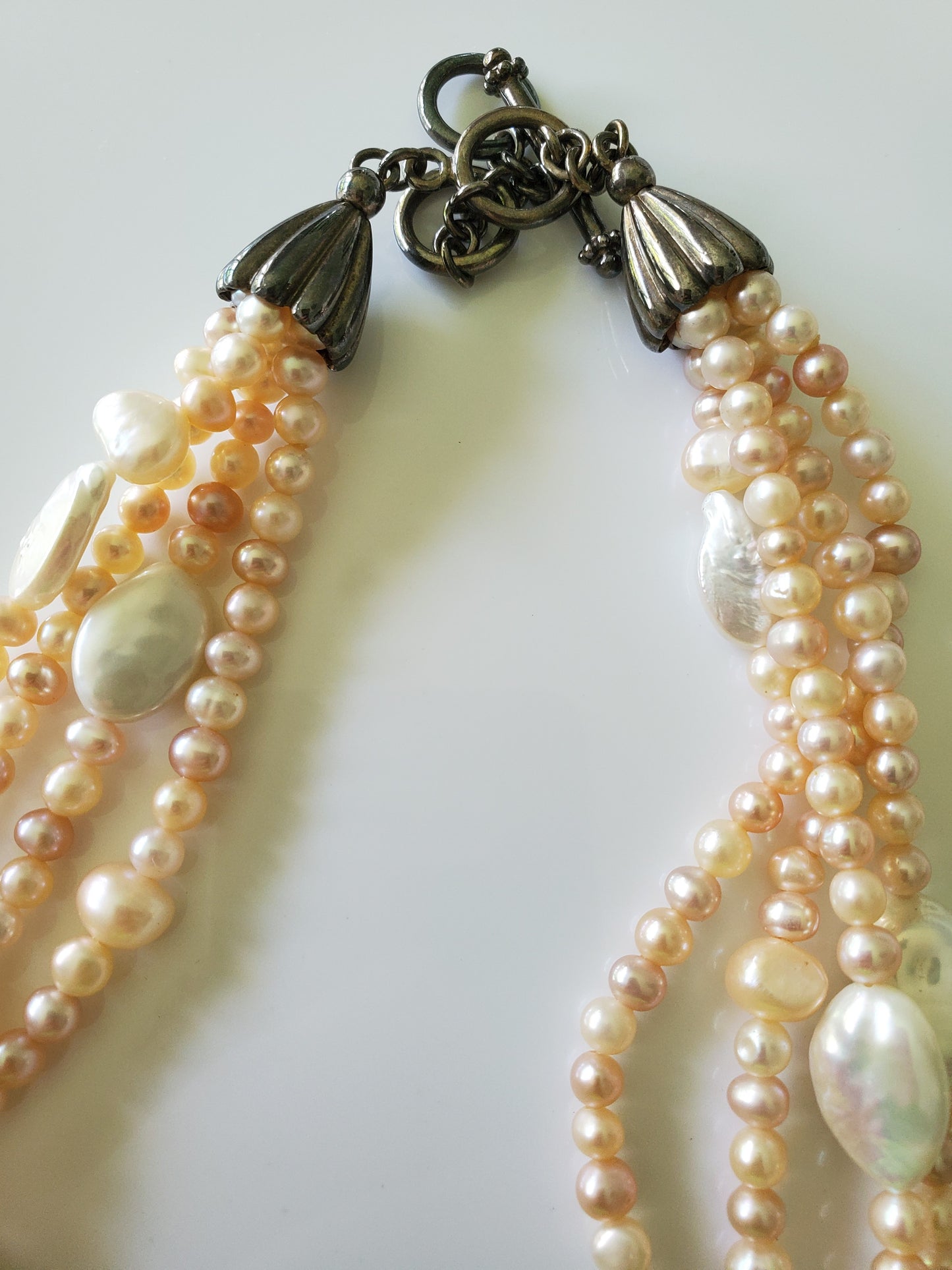 Multi-strand Pink and Cream Freshwater Pearls with Large MOP Pendant