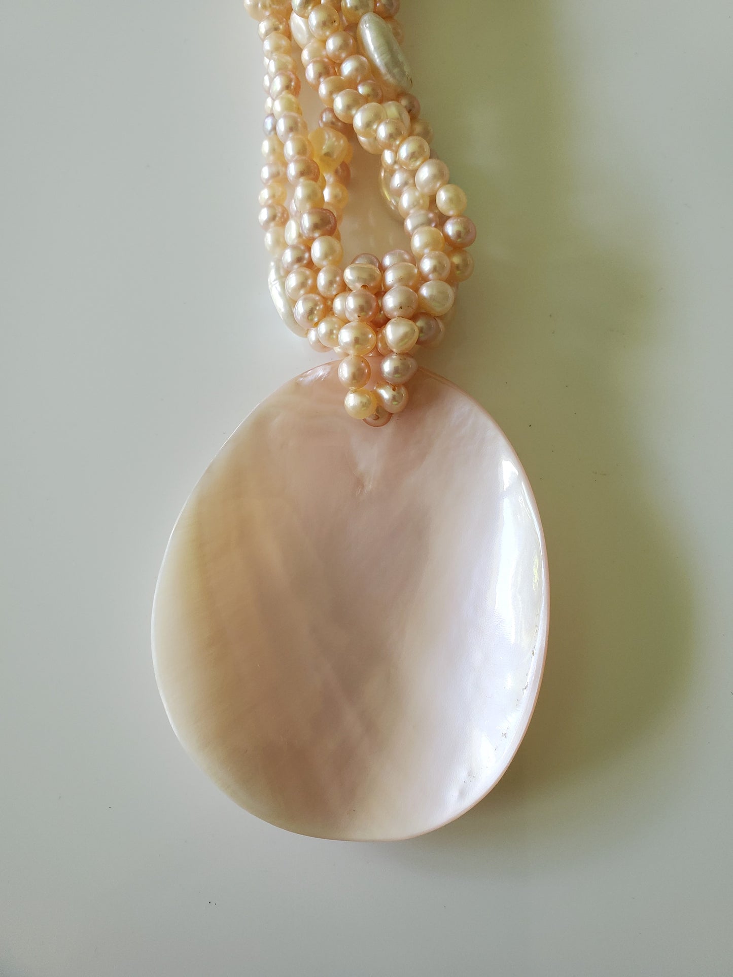 Multi-strand Pink and Cream Freshwater Pearls with Large MOP Pendant