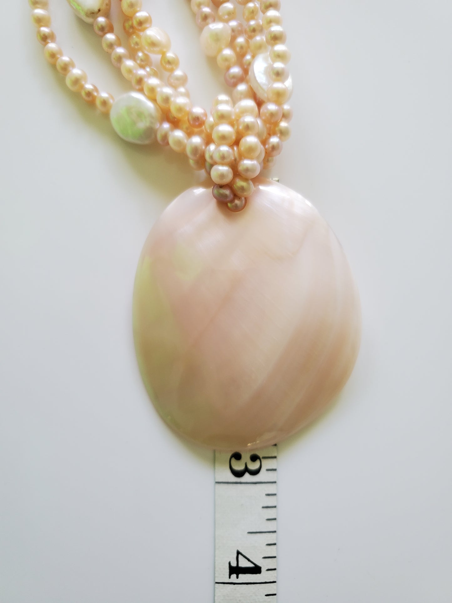 Multi-strand Pink and Cream Freshwater Pearls with Large MOP Pendant