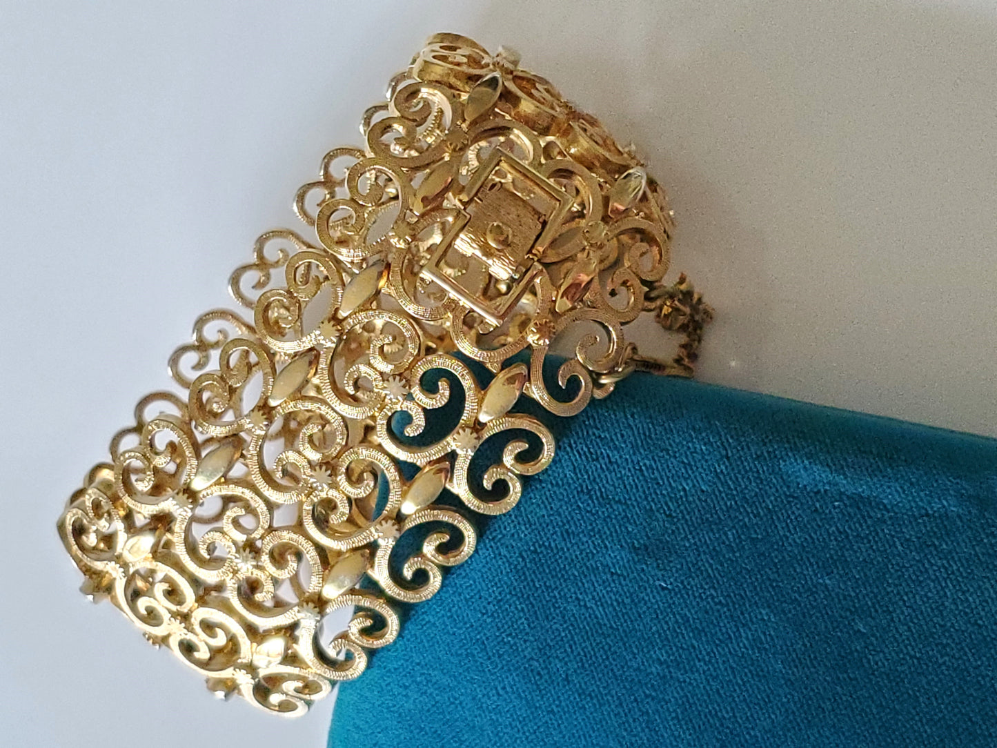 Vintage Monet Designer Wide Filigree Panel Gold-tone Bracelet with safety chain