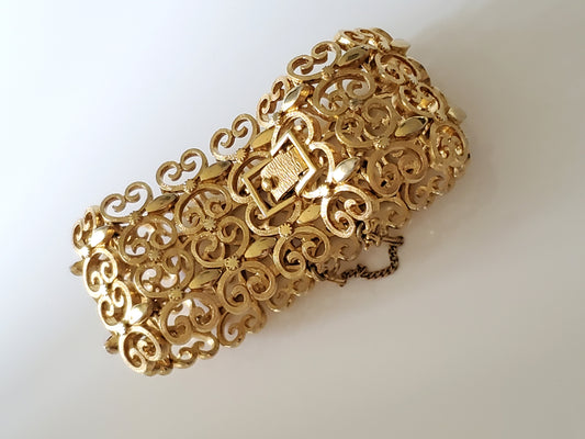 Vintage Monet Designer Wide Filigree Panel Gold-tone Bracelet with safety chain