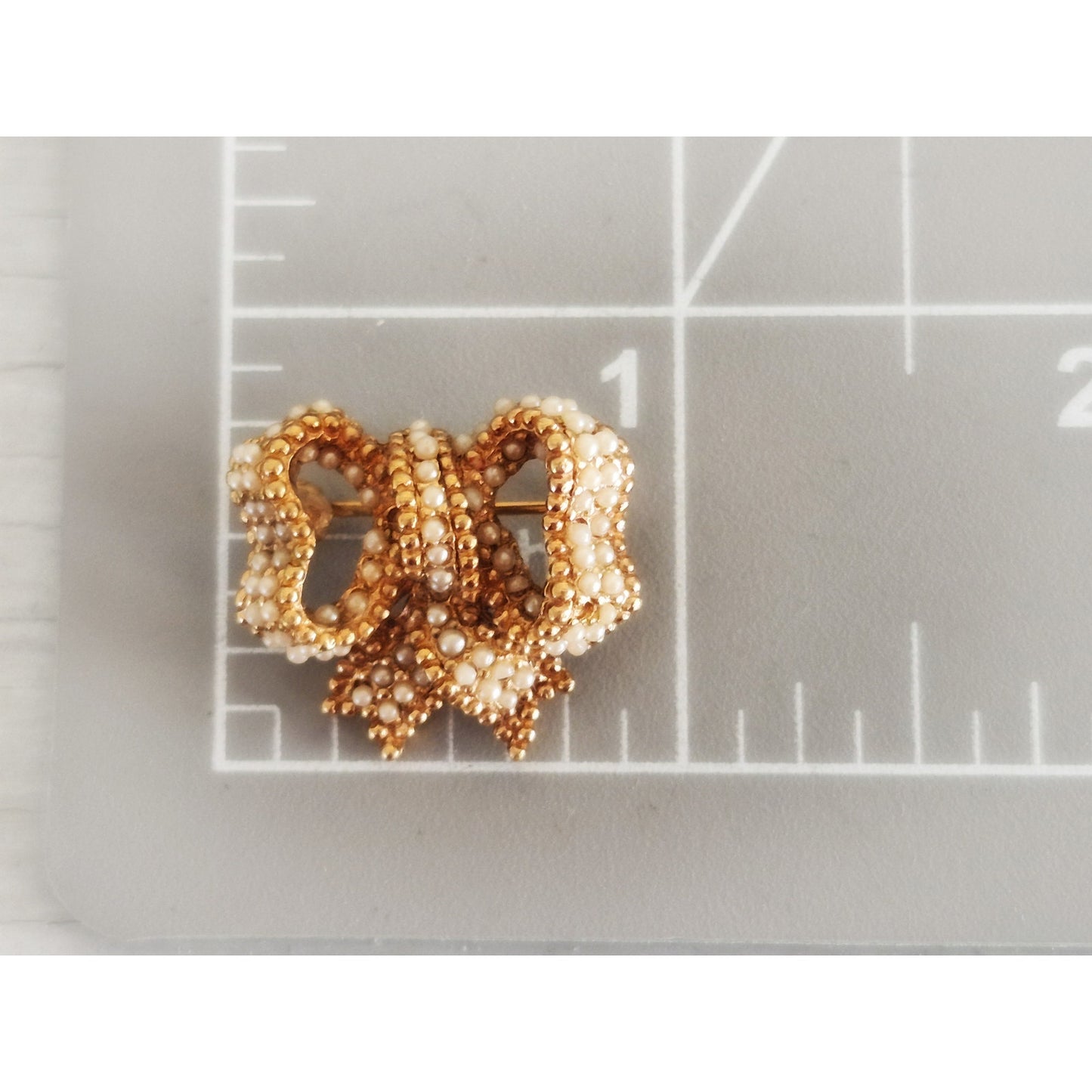 Vintage Signed Ciner Gold Tone Faux Seed Pearl Mini Bow Brooch Pin