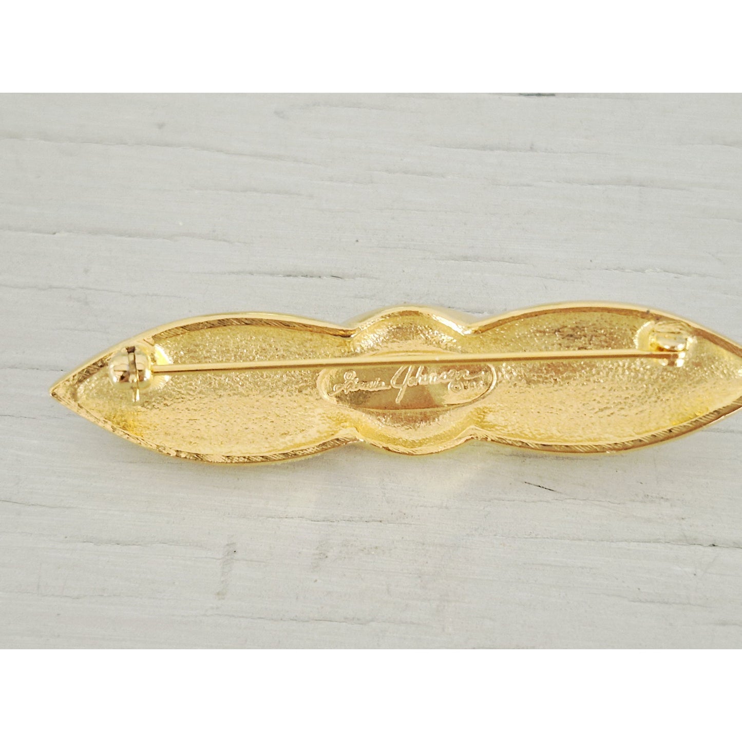 Vintage 1996 Gloria Johnson Black and Gold-tone Brooch