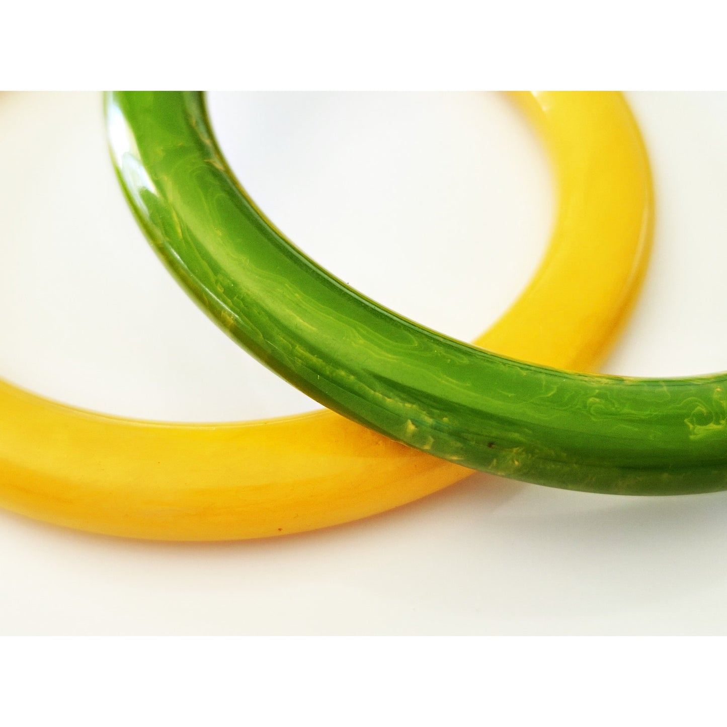 Vintage  Butterscotch Yellow and Green Swirl Bakelite Bangles - Set of 2