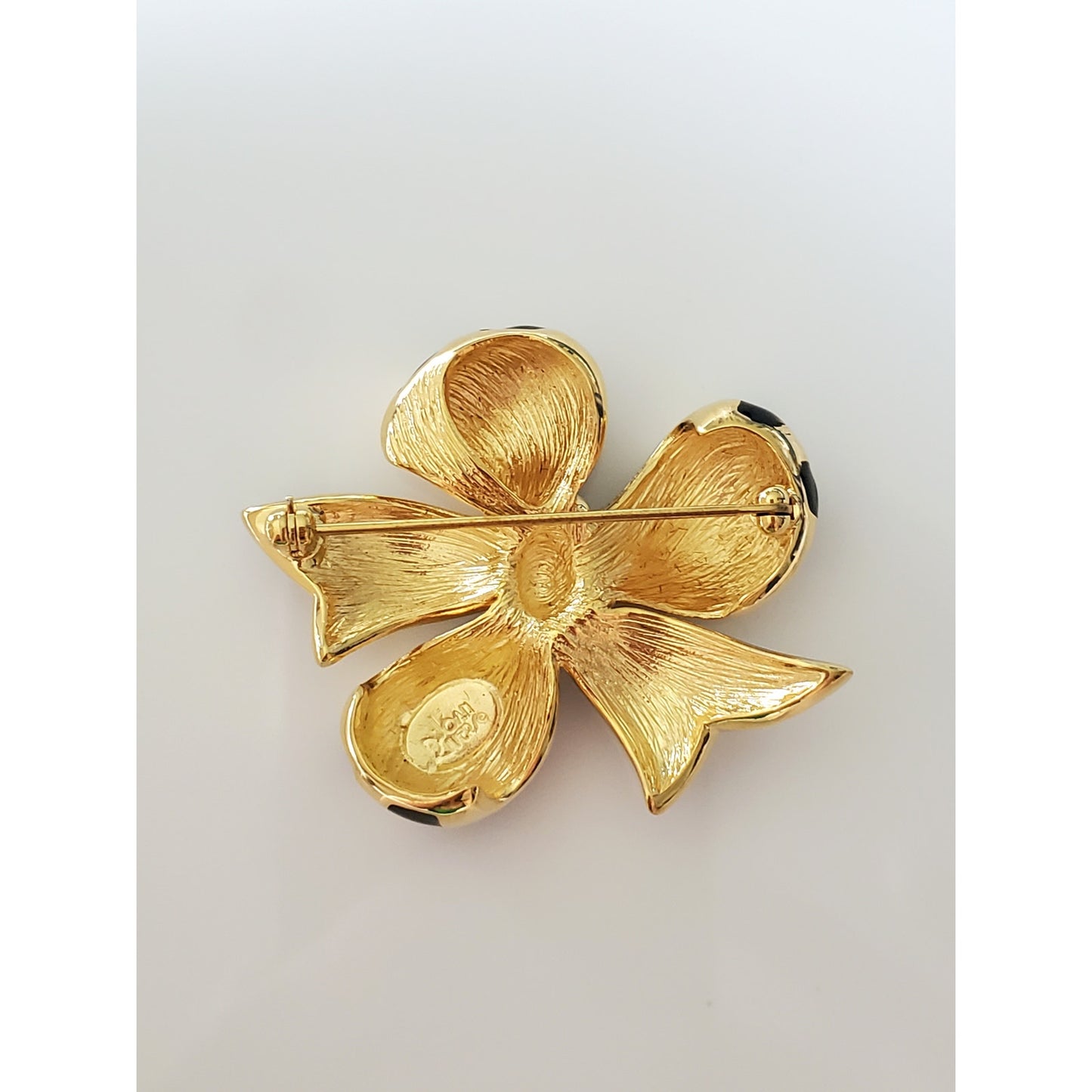 Vintage Joan Rivers Black and Gold Ribbon Brooch
