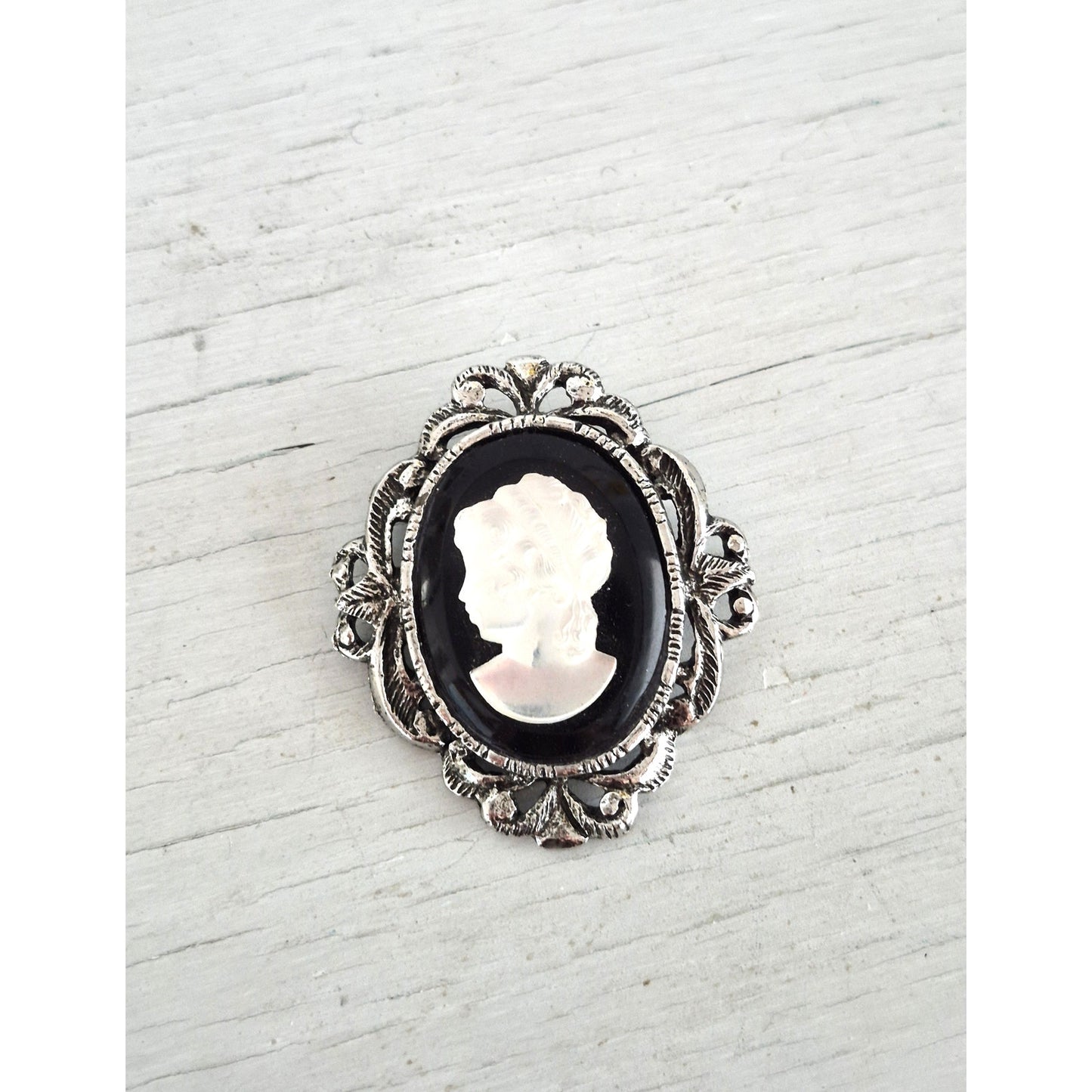 Vintage Black Glass and Mother of Pearl Cameo Brooch