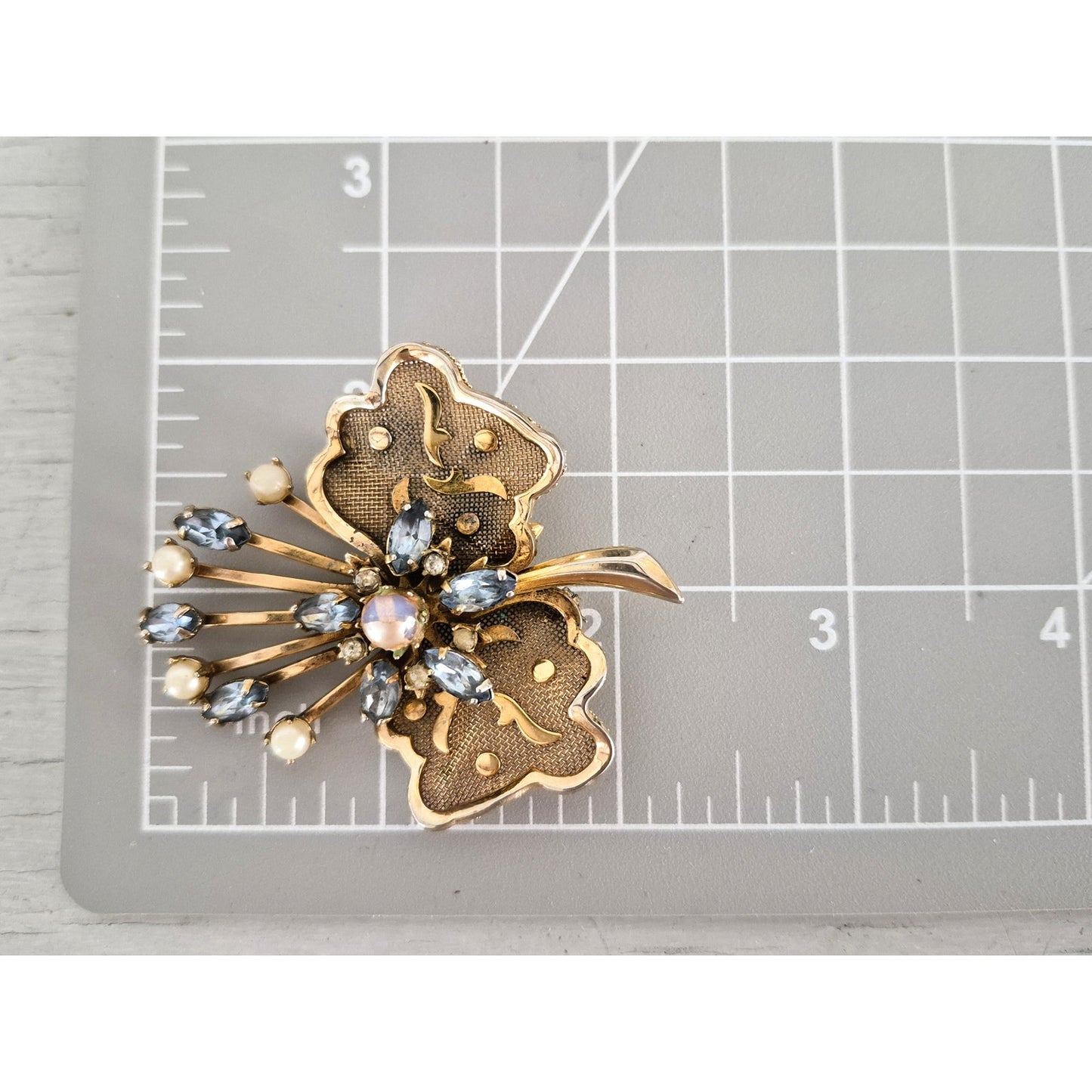 Vintage Gold Tone Blue Rhinestone and Faux Pearl Floral Brooch